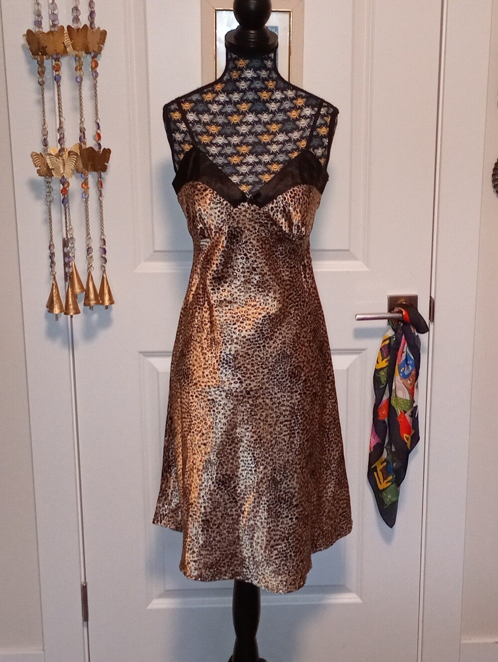 Cheetah print satin slip dress with black satin trim